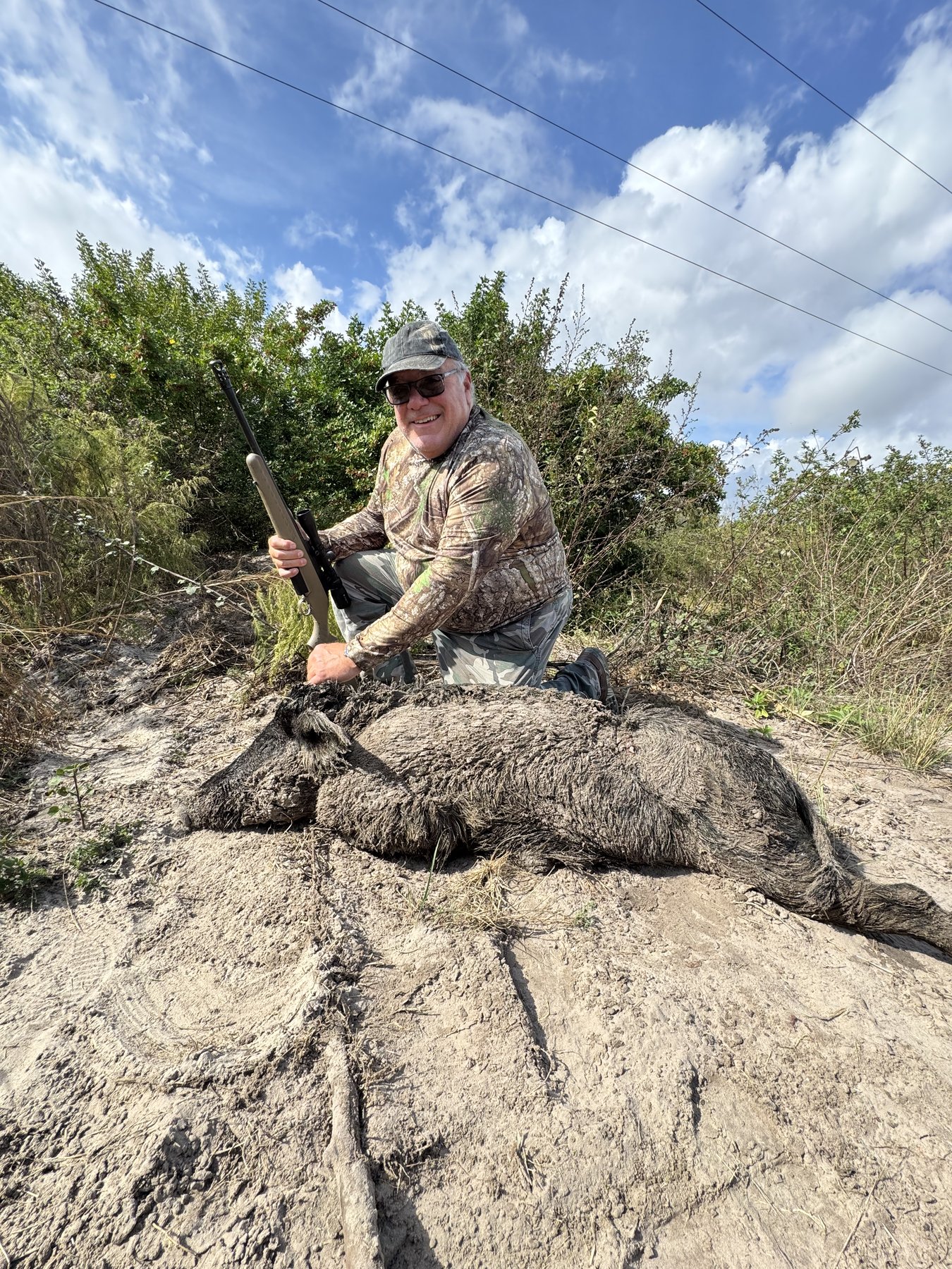 Hunter with wild hog Florida