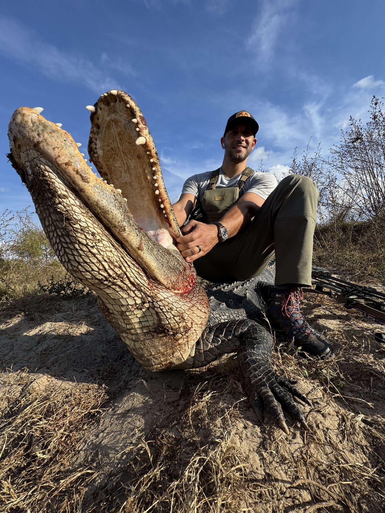 Bow hunter with trophy alligator Florida